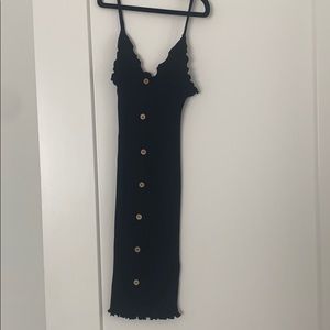 Stretchy black dress with buttons down front